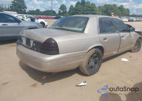 1998 Ford Crown Victoria Police Interceptor z USA, uszkodzony, nr VIN 2FAFP71W0WX158596